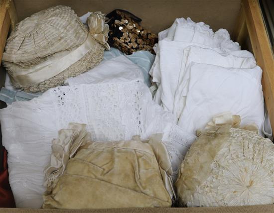 A group of 19th century christening gowns , bonnets etc